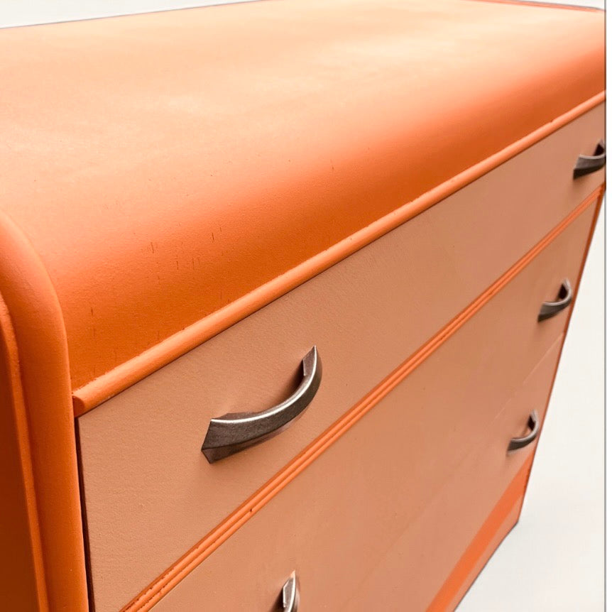 Front view of the retro orange waterfall dresser