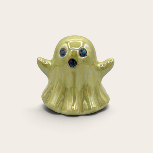 Lime green ghost figurine front view